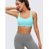 imageCRZ YOGA Womens Light Support Strappy Sports Bra  Low Cut Wirefree Padded Yoga Cami Criss Cross BackTurquoise
