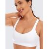imageCRZ YOGA Womens Light Support Strappy Sports Bra  Low Cut Wirefree Padded Yoga Cami Criss Cross BackWhite