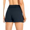 imageCRZ YOGA Womens Lightweight Mid Rise Hiking Shorts 4  Stretch for Athletic Summer Travel Outdoor Golf with Zip PocketsTrue Navy