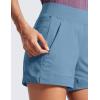 imageCRZ YOGA Womens Lightweight Mid Rise Hiking Shorts 4  Stretch for Athletic Summer Travel Outdoor Golf with Zip PocketsUniverse Blue