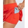 imageCRZ YOGA Womens Quick Dry Pleated Tennis Skirts Mid Waisted Cute Athletic Workout Running Sports Golf Skorts VolleyballPoppy