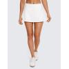 imageCRZ YOGA Womens Quick Dry Pleated Tennis Skirts Mid Waisted Cute Athletic Workout Running Sports Golf Skorts VolleyballWhite