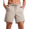 imageCRZ YOGA Casual Workout Mens Shorts 7 Inch Lightweight Quick Dry for Gym Athletic with Zipper PocketMojave Tan