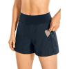 imageCRZ YOGA Womens Lightweight Mid Rise Hiking Shorts 4  Stretch for Athletic Summer Travel Outdoor Golf with Zip PocketsTrue Navy