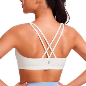 imageCRZ YOGA Womens Light Support Strappy Sports Bra  Low Cut Wirefree Padded Yoga Cami Criss Cross BackWhite Apricot