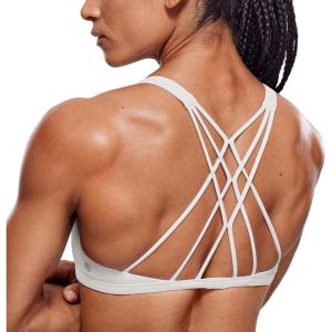 imageCRZ YOGA Womens Strappy Sports Bra  Criss Cross Back Padded Medium Support Wireless Gym Cami Workout YogaMilky White