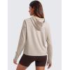 imageCRZ YOGA Cloud Jersey Pullover Hoodies for Women Long Sleeve Hooded Workout Sweat Shirts Casual Yoga Tops with Thumb HolesMojave Tan