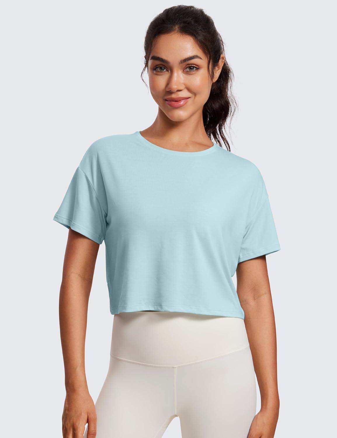 imageCRZ YOGA Open Back Short Sleeve Crop Top for Women Loose Athletic Yoga Workout Shirts Casual Cropped TShirtsPure Blue