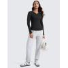 imageCRZ YOGA Ribbed Modal Casual Long Sleeve Henley Shirts for Women Soft Stretchy Knit Layering Basic Fitted Athletic TopsBlack