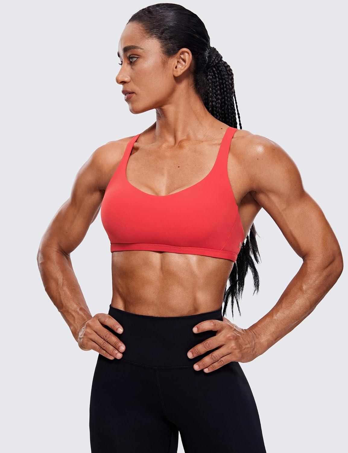 imageCRZ YOGA Womens Strappy Sports Bra  Criss Cross Back Padded Medium Support Wireless Gym Cami Workout YogaCrimson