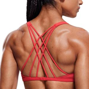 imageCRZ YOGA Womens Strappy Sports Bra  Criss Cross Back Padded Medium Support Wireless Gym Cami Workout YogaCrimson