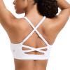imageCRZ YOGA Butterlift Cross Back Sports Bras for Women  Scoop Neck Adjustable Straps Wireless Padded Pilates Workout TopWhite