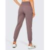 imageCRZ YOGA Lightweight Workout Joggers for Women 26quot285quot305quot  Outdoor Running Casual Pants with PocketsMauve