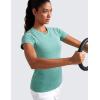 imageCRZ YOGA Seamless Workout Tops for Women Hip Length  Athletic Running Gym Yoga Short Sleeve Shirts Breathable Crewneck TeesCascadia Green Heather