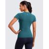 imageCRZ YOGA Seamless Workout Tops for Women Hip Length  Athletic Running Gym Yoga Short Sleeve Shirts Breathable Crewneck TeesGreen Jade