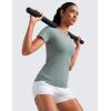 imageCRZ YOGA Seamless Workout Tops for Women Hip Length  Athletic Running Gym Yoga Short Sleeve Shirts Breathable Crewneck TeesGreen Palm Court