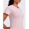 imageCRZ YOGA Seamless Workout Tops for Women Hip Length  Athletic Running Gym Yoga Short Sleeve Shirts Breathable Crewneck TeesStrawberry Pink