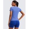 imageCRZ YOGA Seamless Workout Tops for Women Hip Length  Athletic Running Gym Yoga Short Sleeve Shirts Breathable Crewneck TeesWild Indigo