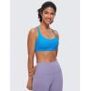 imageCRZ YOGA Naked Feeling Strappy Sports Bras for Women  Criss Cross Back Wireless Padded Cami Yoga Workout TopMadagascar Blue