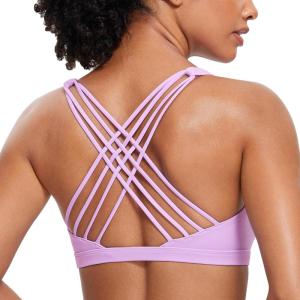 imageCRZ YOGA Naked Feeling Strappy Sports Bras for Women  Criss Cross Back Wireless Padded Cami Yoga Workout TopLilac