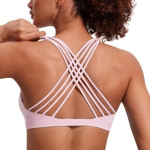 imageCRZ YOGA Naked Feeling Strappy Sports Bras for Women  Criss Cross Back Wireless Padded Cami Yoga Workout TopStrawberry Pink