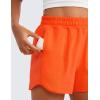 imageCRZ YOGA Girls FeatheryFit Soft Athletic Shorts with Zipper Pocket  Tennis Soccer Running Casual Liner Kids TeenNeon Orange