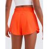 imageCRZ YOGA Girls FeatheryFit Soft Flowy Athletic Shorts  Tennis Soccer Casual Ruffle Skirt Zip Pocket Liner Kids TeenNeon Orange