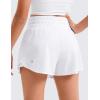 imageCRZ YOGA Girls FeatheryFit Soft Flowy Athletic Shorts  Tennis Soccer Casual Ruffle Skirt Zip Pocket Liner Kids TeenWhite