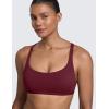 imageCRZ YOGA Womens Naked Feeling Criss Cross Sports Bra  Strappy Back Padded Medium Support Wireless Gym Cami Workout YogaRed Merlot