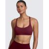 imageCRZ YOGA Womens Naked Feeling Criss Cross Sports Bra  Strappy Back Padded Medium Support Wireless Gym Cami Workout YogaRed Merlot