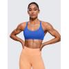 imageCRZ YOGA Womens Naked Feeling Criss Cross Sports Bra  Strappy Back Padded Medium Support Wireless Gym Cami Workout YogaWaves Blue