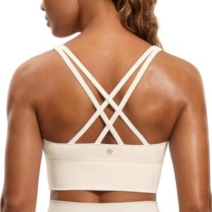 imageCRZ YOGA Naked Feeling Strappy Longline Sports Bras for Women  Medium Impact Criss Cross Yoga Padded Workout Crop TopWhite Apricot