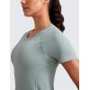 imageCRZ YOGA Seamless Workout Tops for Women Waist Length  Running Gym Athletic Yoga Short Sleeve Shirts Breathable CrewneckGreen Palm Court