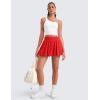 imageCRZ YOGA High Waisted Bubble Tennis Skirts for Women  Mini Casual Ruffled Hem Lined Balloon Skort with PocketsDeep Red