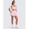imageCRZ YOGA High Waisted Bubble Tennis Skirts for Women  Mini Casual Ruffled Hem Lined Balloon Skort with PocketsStrawberry Pink