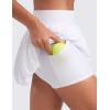 imageCRZ YOGA High Waisted Bubble Tennis Skirts for Women  Mini Casual Ruffled Hem Lined Balloon Skort with PocketsWhite