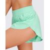 imageCRZ YOGA Mid Waisted Split Running Shorts for Women 4  Comfy Mesh Liner for Workout Athletic Gym Track Quick DryMint Moment