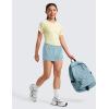 imageCRZ YOGA Girls FeatheryFit Soft 2 in 1 Dolphin Athletic Shorts  Tennis Soccer Running Casual Liner Pockets Kids TeenLight Grayish Blue