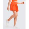 imageCRZ YOGA Girls FeatheryFit Soft Athletic Pleated Skirts  Tennis School Casual Skorts with Pockets Liner Kids TeenNeon Orange