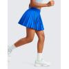 imageCRZ YOGA Girls FeatheryFit Soft Athletic Pleated Skirts  Tennis School Casual Skorts with Pockets Liner Kids TeenSparkle Blue