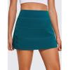 imageCRZ YOGA High Waisted A line Golf Skirts for Women  Mini Lined Tennis Casual Work Skorts with 3 PocketsBorealis Green