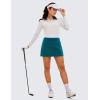 imageCRZ YOGA High Waisted A line Golf Skirts for Women  Mini Lined Tennis Casual Work Skorts with 3 PocketsBorealis Green
