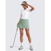 imageCRZ YOGA High Waisted A line Golf Skirts for Women  Mini Lined Tennis Casual Work Skorts with 3 PocketsGreen Palm Court