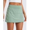 imageCRZ YOGA High Waisted A line Golf Skirts for Women  Mini Lined Tennis Casual Work Skorts with 3 PocketsGreen Palm Court