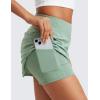 imageCRZ YOGA High Waisted A line Golf Skirts for Women  Mini Lined Tennis Casual Work Skorts with 3 PocketsGreen Palm Court