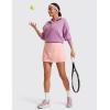 imageCRZ YOGA High Waisted A line Golf Skirts for Women  Mini Lined Tennis Casual Work Skorts with 3 PocketsPuff Pink
