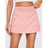 imageCRZ YOGA High Waisted A line Golf Skirts for Women  Mini Lined Tennis Casual Work Skorts with 3 PocketsPuff Pink