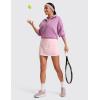 imageCRZ YOGA High Waisted A line Golf Skirts for Women  Mini Lined Tennis Casual Work Skorts with 3 PocketsStrawberry Pink