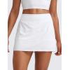 imageCRZ YOGA High Waisted A line Golf Skirts for Women  Mini Lined Tennis Casual Work Skorts with 3 PocketsWhite