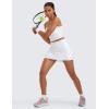 imageCRZ YOGA High Waisted A line Golf Skirts for Women  Mini Lined Tennis Casual Work Skorts with 3 PocketsWhite
